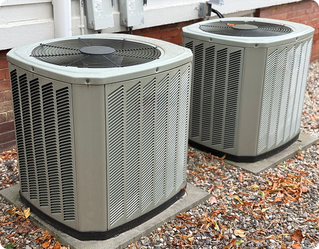 Outdoor air conditioning system with fallen leaves