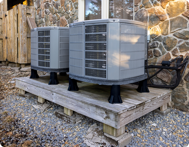 Outdoor air conditioning units on wooden platform